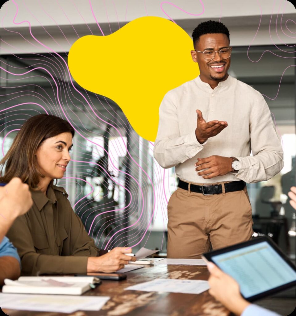 Team members conversing around a meeting table