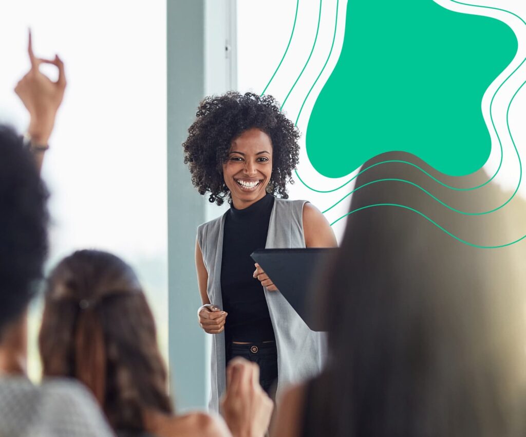 Woman presenting in front of an audience